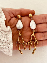 Učitaj sliku u preglednik galerije, Elevate your summer style with these stunning handmade statement earrings, featuring a bold combination of a lustrous natural freshwater pearl and a striking coral drop. Crafted from gold-plated stainless steel for durability and shine, these lightweight yet eye-catching earrings blend elegance with a touch of coastal charm—perfect for any occasion.
