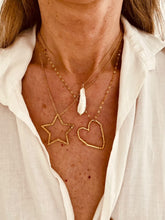 Load image into Gallery viewer, Embrace timeless elegance with this delicate stainless steel necklace, showcasing a stunning irregular long freshwater pearl charm. The unique shape of the pearl adds a touch of natural beauty, while the sleek chain brings a modern edge to your look. Perfect for layering or as a statement piece, this necklace effortlessly combines sophistication with a subtle, organic flair.
