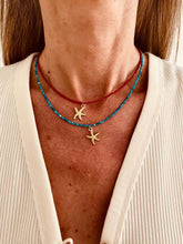 Load image into Gallery viewer, Red and blue rhinestone necklaces styled together
