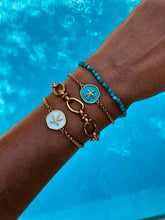 Load image into Gallery viewer, Minimalist starfish bracelet inspired by Mediterranean beaches.
