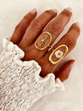 Load image into Gallery viewer, Women's gold plated ring designed with a starfish motif and soft nude centre
