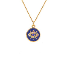 Load image into Gallery viewer, Close-up of blue cubic zirconia evil eye pendant on stainless steel necklace showcasing sparkle detail and premium jewelry craftsmanship
