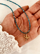 Load image into Gallery viewer, Close-up of the ASTRA starfish pendant with sparkling rhinestone beads.
