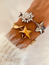 Load image into Gallery viewer, Close-up of sun star and moon charms showcasing elegant minimal jewelry craftsmanship
