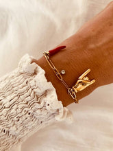 Load image into Gallery viewer, Chili charm bracelet worn on wrist highlighting expressive statement jewelry style
