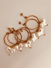 Load image into Gallery viewer, Close-up of acrylic heart earrings highlighting glossy texture and vibrant finish
