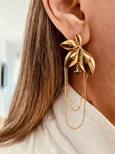 Load image into Gallery viewer, Zircon flower star earrings styled with outfit emphasizing feminine elegant fashion jewelry appeal
