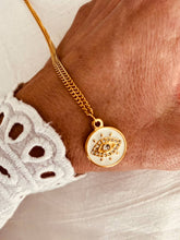 Load image into Gallery viewer, Stainless steel evil eye necklace with white cubic zirconia pendant shown from front angle highlighting elegant chain and luxury minimalist design
