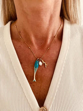 Load image into Gallery viewer, Gold plated stainless steel fish necklace perfect for summer styling.

