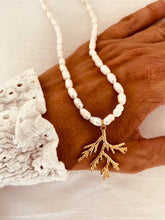 Load image into Gallery viewer, GRAZINA freshwater pearl necklace with a gold coral pendant crafted from gold plated stainless steel.
