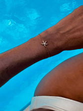 Load image into Gallery viewer, ADELE bracelet featuring a crystal-covered gold starfish.
