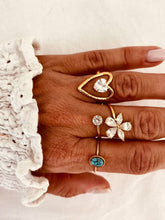 Load image into Gallery viewer, Romantic gold heart ring paired with turquoise jewellery for a layered summer look
