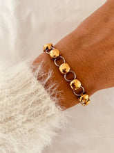 Load image into Gallery viewer, Gold and silver bean chain bracelet in stainless steel shown from front angle highlighting modern two tone jewelry design
