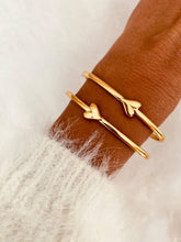 Load image into Gallery viewer, HEMALA gold open cuff bracelet with heart detail.
