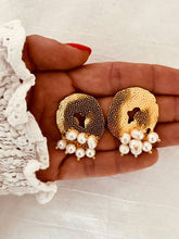 Load image into Gallery viewer, Hammered circle pearl drop earrings in stainless steel shown from front angle highlighting French inspired vintage jewelry design
