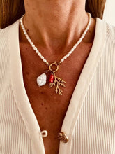 Load image into Gallery viewer, Coastal pearl necklace styled on model showing elegant feminine summer jewelry aesthetic
