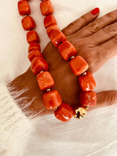 Load image into Gallery viewer, Coral Marble statement necklace showcasing vibrant marbled resin beads with polished gold details for a bold modern look.

