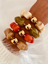 Load image into Gallery viewer, Stack of IZZA marble bracelets featuring Cream Marble, Olive Marble, Taupe Marble and Coral Marble colour variations.
