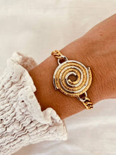 Load image into Gallery viewer, Two tone disc bracelet styled with outfit demonstrating clean modern everyday jewelry style
