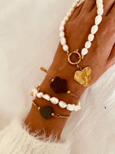 Učitaj sliku u preglednik galerije, Freshwater pearl heart necklace styled together with Bernat Jewelry bracelets, creating a sophisticated layered jewelry look.
