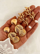 Load image into Gallery viewer, Elegant gold shell earrings for summer styling.
