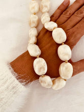 Load image into Gallery viewer, POXAM ivory resin statement necklace with organic sculptural beads.
