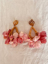 Load image into Gallery viewer, Handwoven rattan earrings decorated with pink petals.
