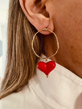 Load image into Gallery viewer, Close-up of red acrylic heart earrings showcasing vibrant color and glossy finish with modern design
