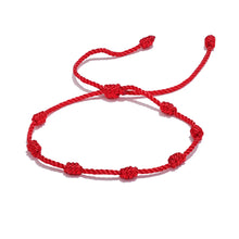 Load image into Gallery viewer, Red string lucky bracelet with adjustable rope design shown from front angle highlighting symbolic jewelry meaning
