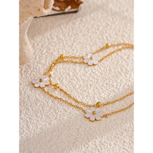 Učitaj sliku u preglednik galerije, Add a touch of summer romance to your style with this exquisitely crafted gold anklet. Made from high-quality, gold-plated stainless steel, it features a delicate double-chain design. One chain is adorned with dainty gold beads, while the other is beautifully decorated with charming white flowers, creating a perfect balance of elegance and whimsy. With its secure lobster clasp and adjustable length, this anklet is the ideal accessory to enhance your summer look, adding a subtle yet sophisticated touch to yo

