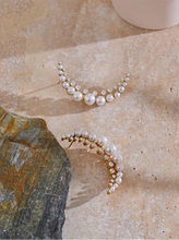 Load image into Gallery viewer, Add a touch of elegance to your look with these high-grade moon stud earrings, featuring dazzling cubic zirconia and luminous simulated pearls. Crafted from durable stainless steel, these delicate earrings offer a timeless yet modern charm, perfect for both casual and formal occasions. A stylish and sophisticated gift, they make a stunning addition to any jewelry collection.
