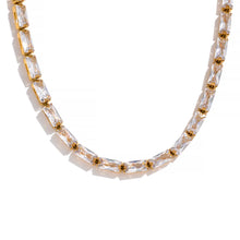 Load image into Gallery viewer, Add a touch of elegance with this waterproof fashion necklace, featuring dazzling white cubic zirconia set in high-quality stainless steel. Designed for durability and shine, this gorgeous piece exudes sophistication, making it perfect for both everyday wear and special occasions. A timeless accessory that enhances any outfit, it’s a must-have for any jewelry lover.

