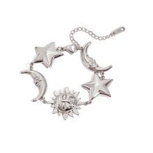 Load image into Gallery viewer, Silver sun star moon bracelet displayed on neutral background showcasing clean modern aesthetic
