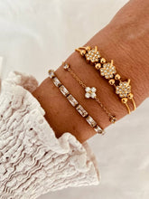 Load image into Gallery viewer, Close-up of zircon clover bracelet capturing shine and detailed sparkle
