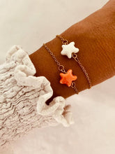 Load image into Gallery viewer, Close-up of ceramic star charm on gold plated bracelet highlighting texture and elegant design

