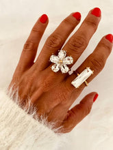 Load image into Gallery viewer, Women's adjustable crystal flower ring crafted from stainless steel with real gold plating and brilliant clear crystals.
