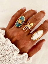 Load image into Gallery viewer, Adjustable octopus ring styled with seahorse and coastal inspired jewellery
