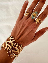 Load image into Gallery viewer, Turquoise ring worn as bold statement jewelry highlighting standout fashion style
