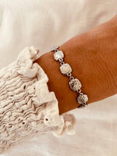 Load image into Gallery viewer, Stainless steel chain bracelet with textured disc elements displayed in clean product view
