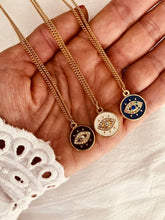 Load image into Gallery viewer, White blue and black cubic zirconia evil eye necklaces displayed together highlighting color options and modern jewelry design variety
