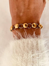 Load image into Gallery viewer, Close-up of gold and silver chain bracelet showcasing mixed metal design and polished finish
