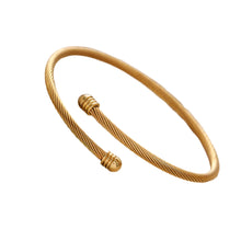 Load image into Gallery viewer, Vintage open bangle bracelet in gold and gold stainless steel shown from front angle highlighting minimalist elegant jewelry design
