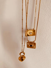 Load image into Gallery viewer, Gold sun pendant necklace with adjustable length for versatile styling
