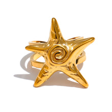 Load image into Gallery viewer, Statement coastal ring with sculptural starfish silhouette and luxurious gold-plated finish
