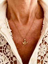 Load image into Gallery viewer, Gold angel necklace styled as an elegant everyday accessory
