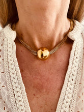 Load image into Gallery viewer, Woman wearing layered ball necklace styled with a modern outfit
