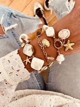 Load image into Gallery viewer, Gold-plated shell charm bracelet designed for beach holidays and resort wear

