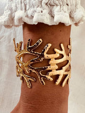 Load image into Gallery viewer, Bold gold cuff bracelet inspired by coral reefs and Mediterranean coastal elegance
