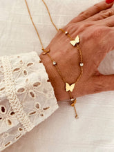 Load image into Gallery viewer, 18K gold plated stainless steel butterfly necklace with cubic zirconia accents and delicate dangling chain detail displayed on a fine elegant chain
