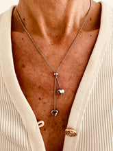 Load image into Gallery viewer, Necklace styled with elegant evening outfit highlighting refined layered effect and feminine detail
